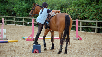 Should You Mount from the Ground or Use a Mounting Block?
